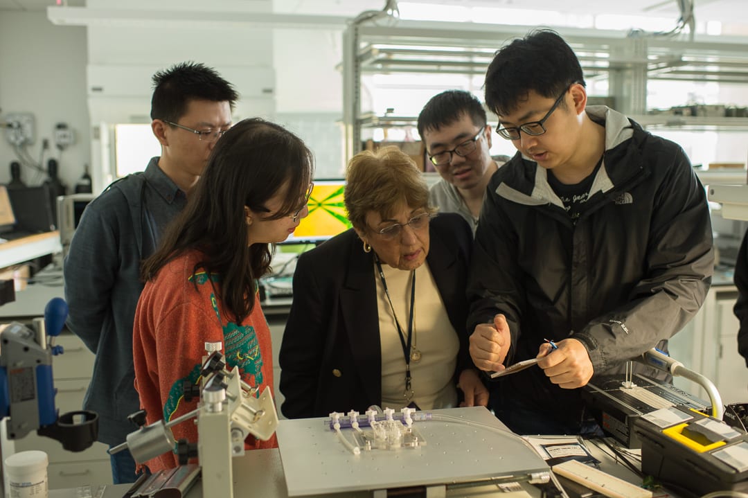 Professor Zaghloul and students working on project