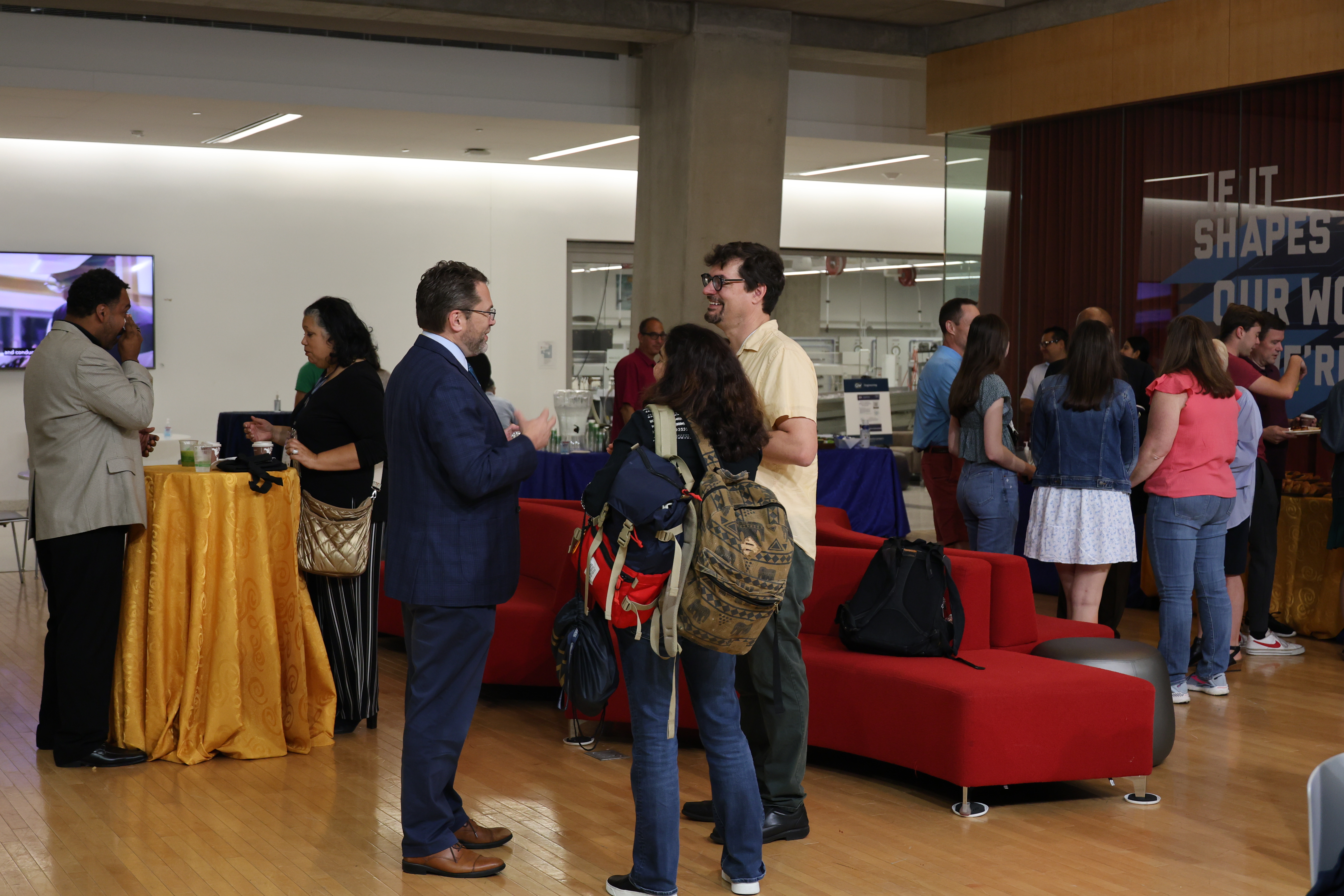 Dean Lach talking with GW Engineering alumni