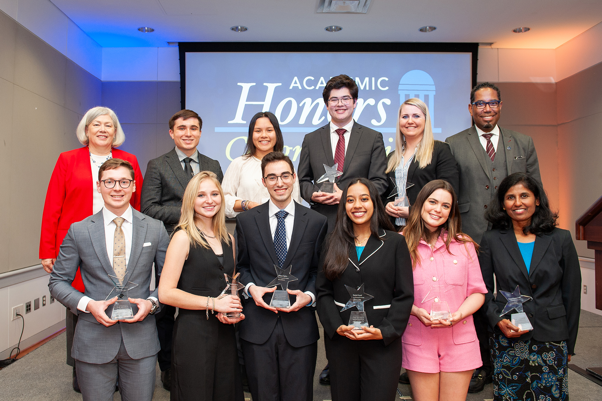 President Ellen M. Granberg and Provost Christopher Alan Bracey recognized the 10 Distinguished Scholars in a ceremony Thursday at University Student Center.
