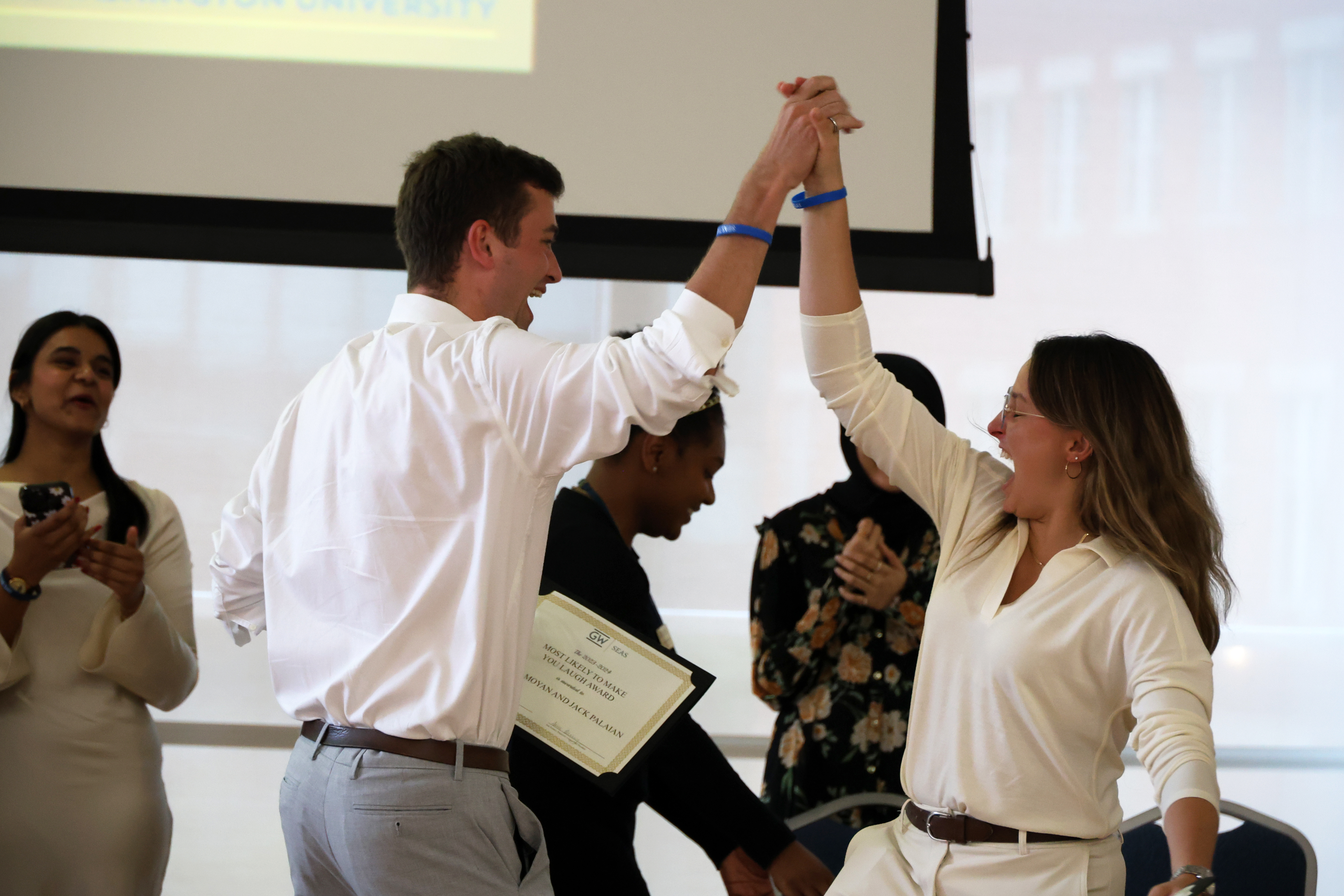 Lily Samoyan and Jack Palaian receiving their E-Council award