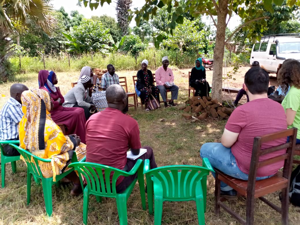 Elmore and Hatcher discussing with community members