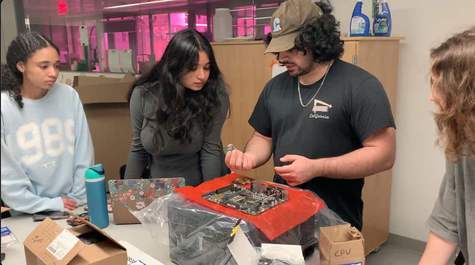 GW Engineering students building and refurbishing the personal computers for the computer lab.