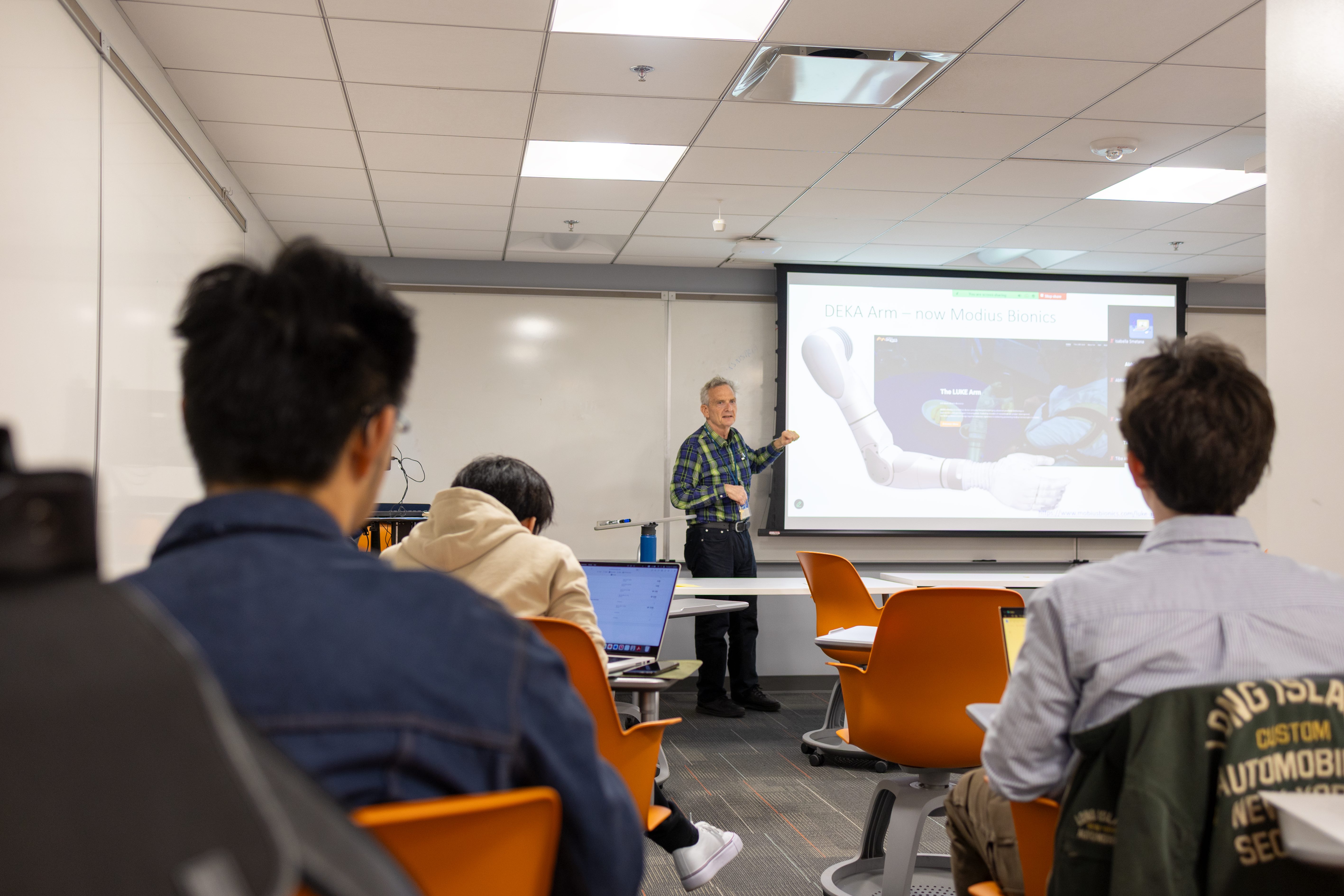 Professor Victor Krauthamer teaching the class Rehabilitation Medicine Engineering.