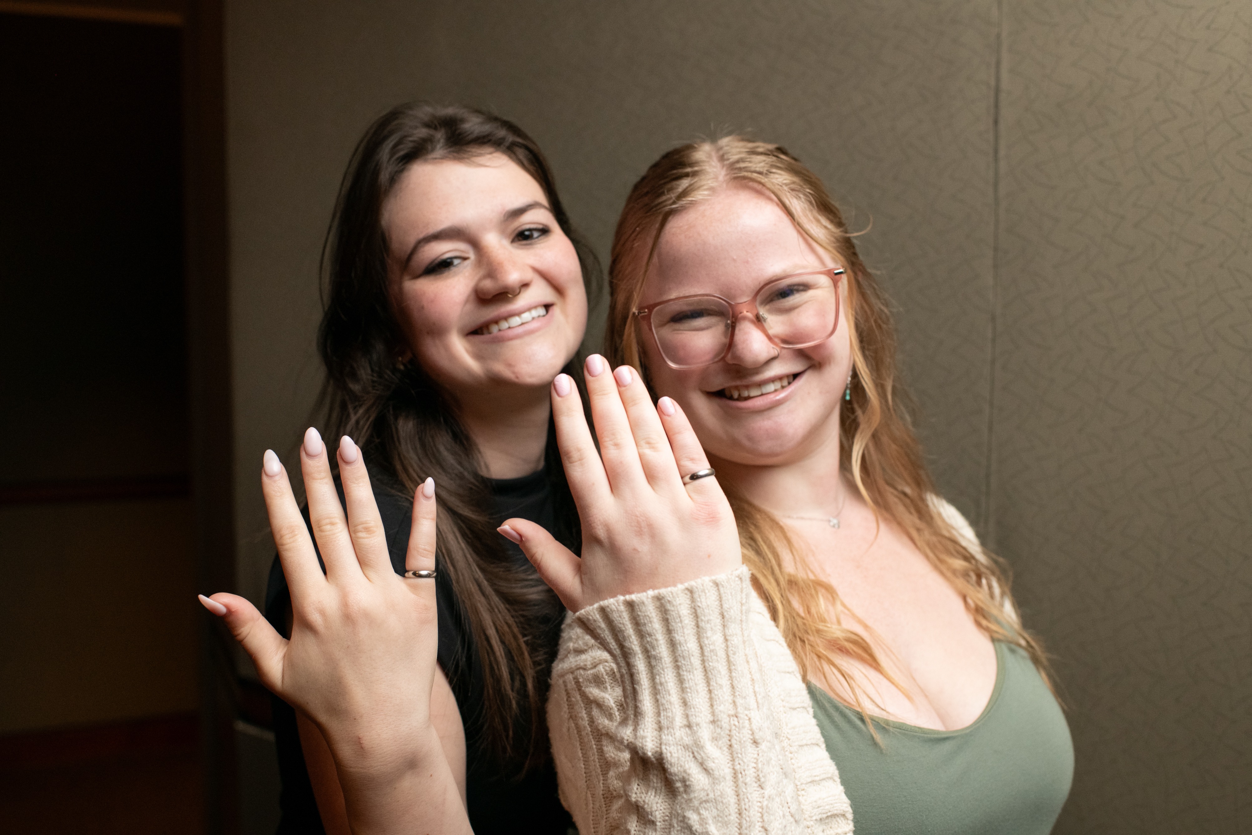 Engineering students pose with their rings