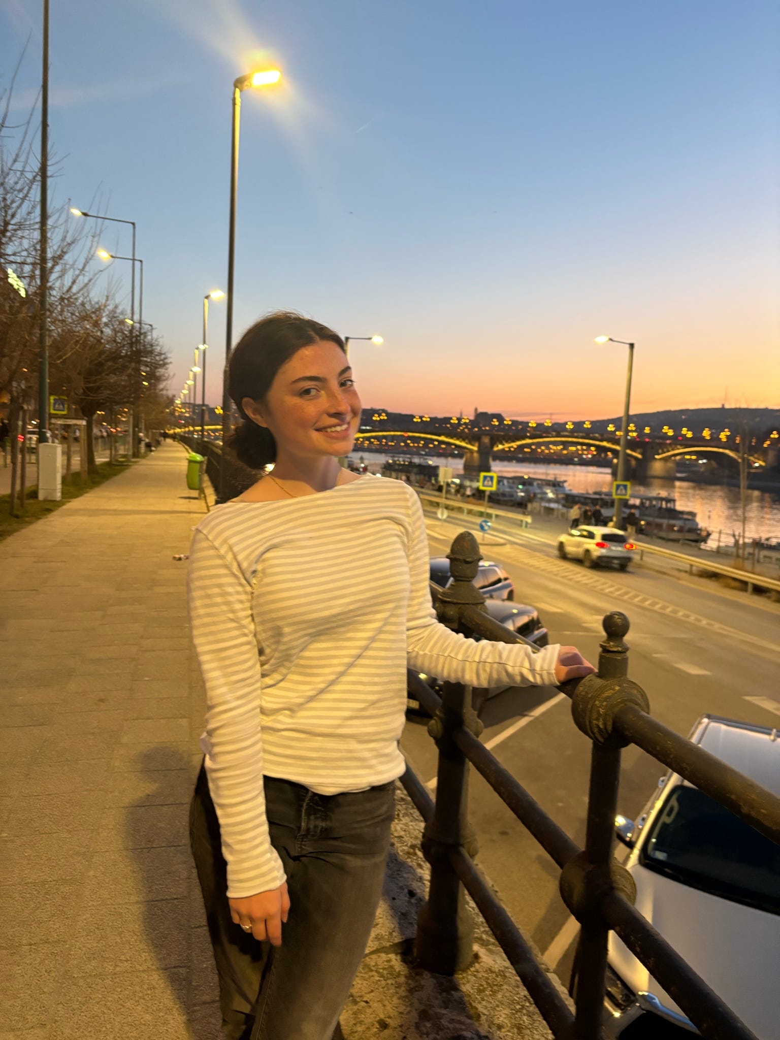 Lily C in a white long sleeve shirt