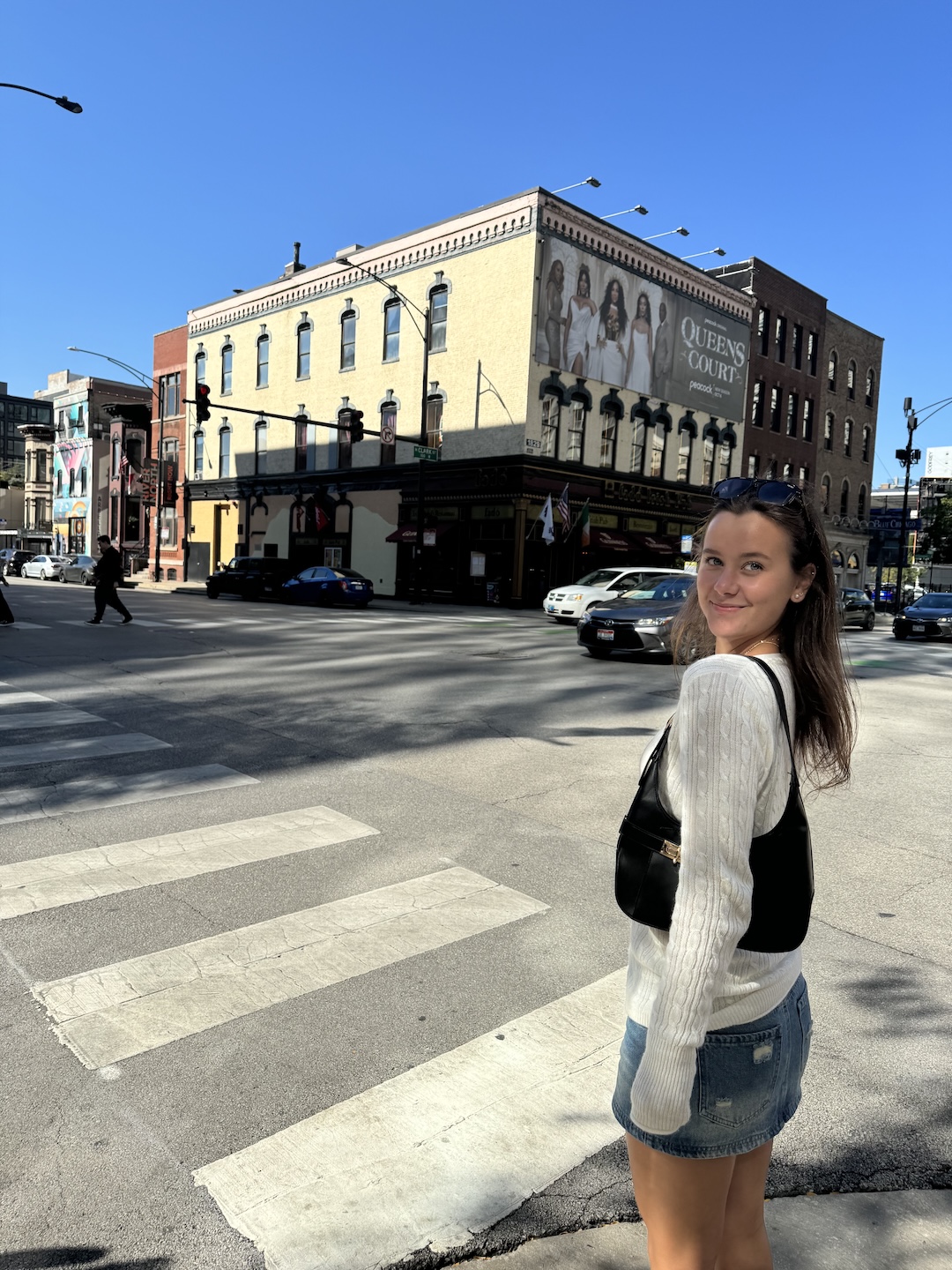 Maddy standing in a crosswalk