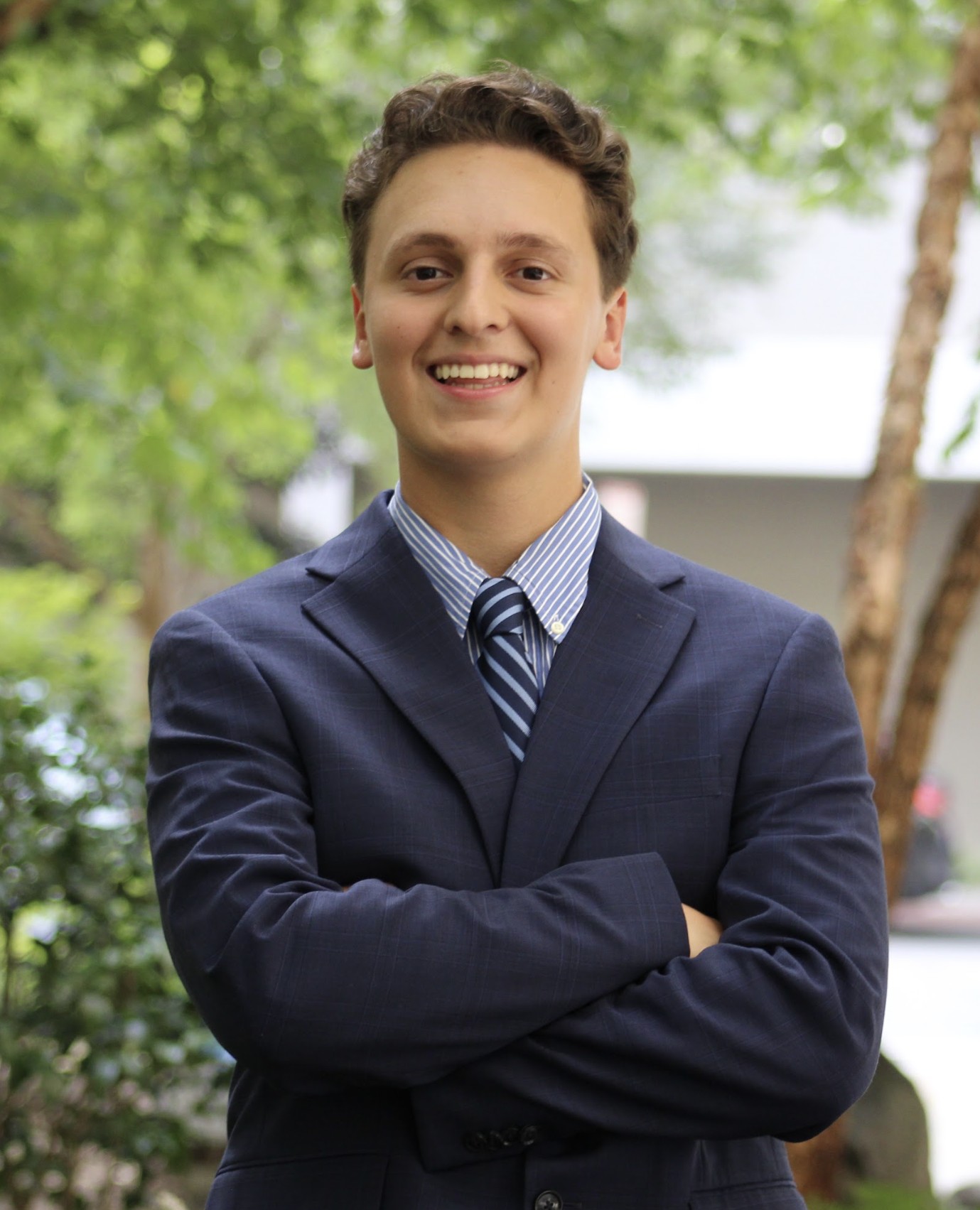 Marc in a navy suit