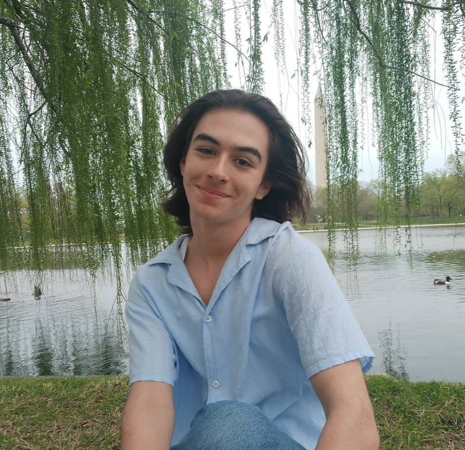 Ryan in a light blue button up shirt
