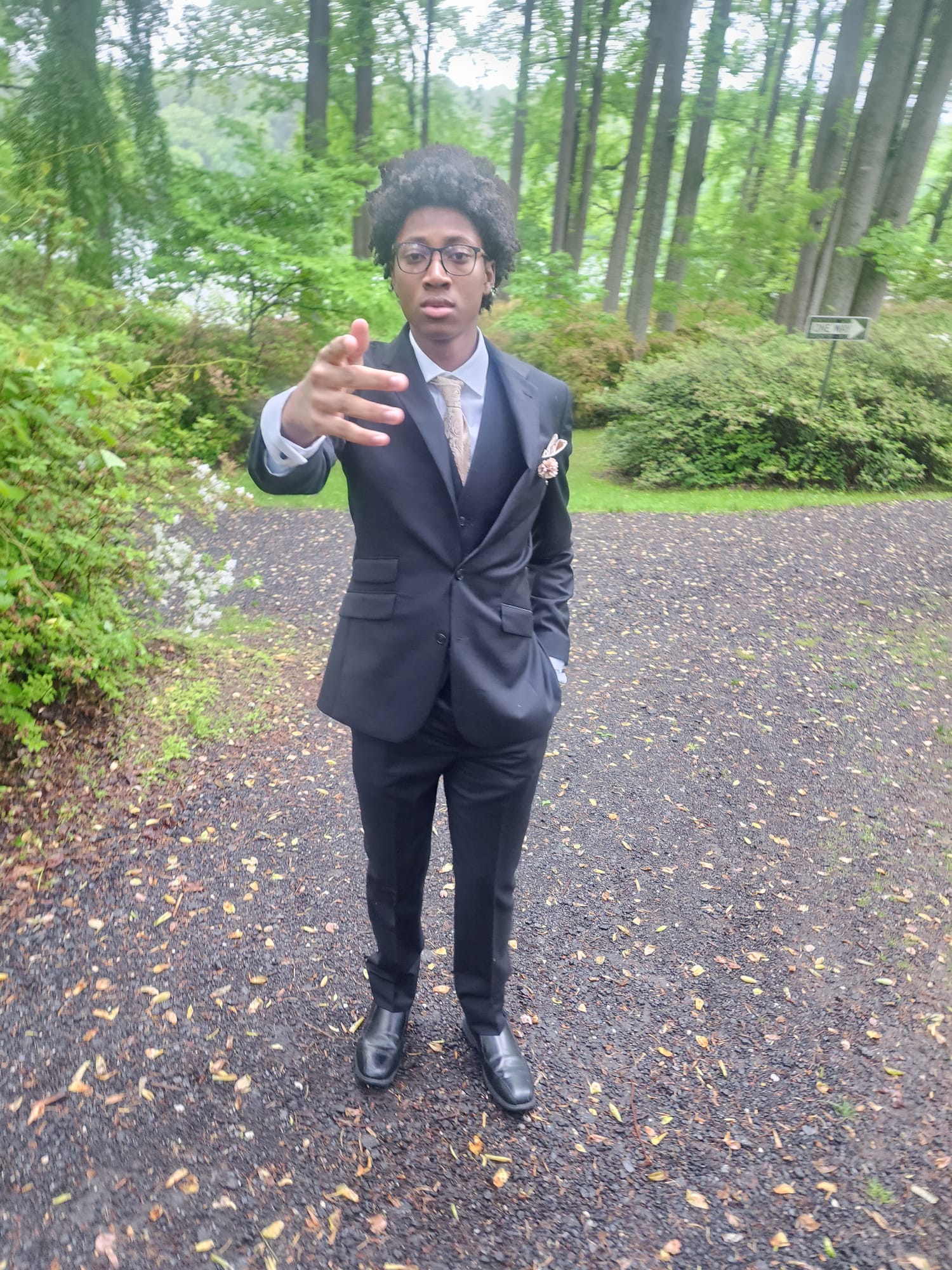 Tobi in a black suit