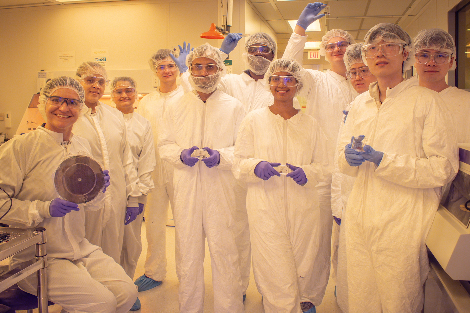 Students in Gina Adam's class holding their microchips