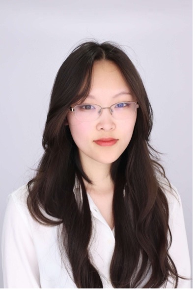Student in white collard shirt