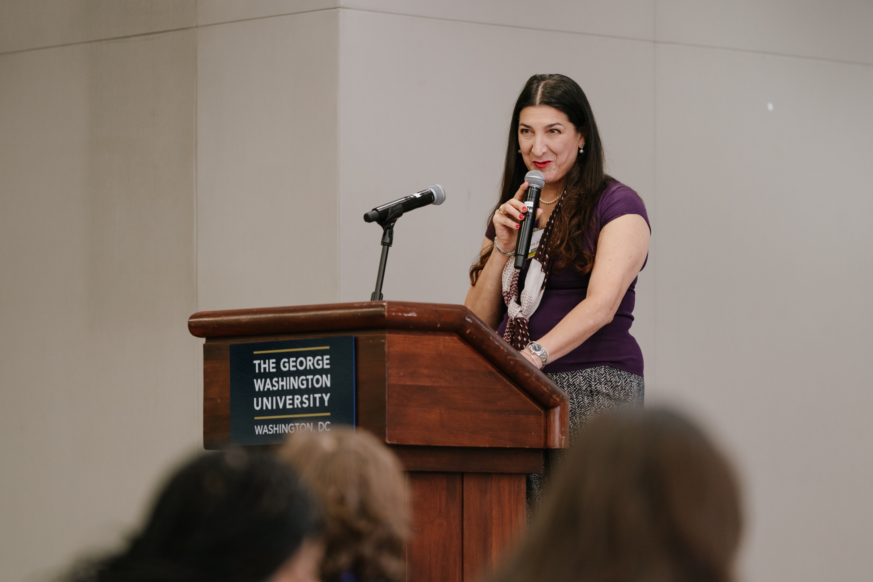 Lorena Barba speaking at a podium