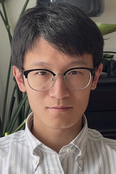 Professor in white striped shirt