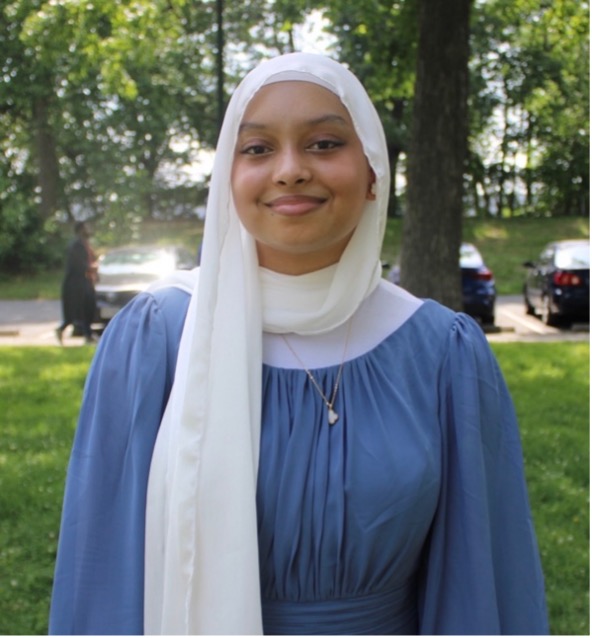 GW Student under a tree