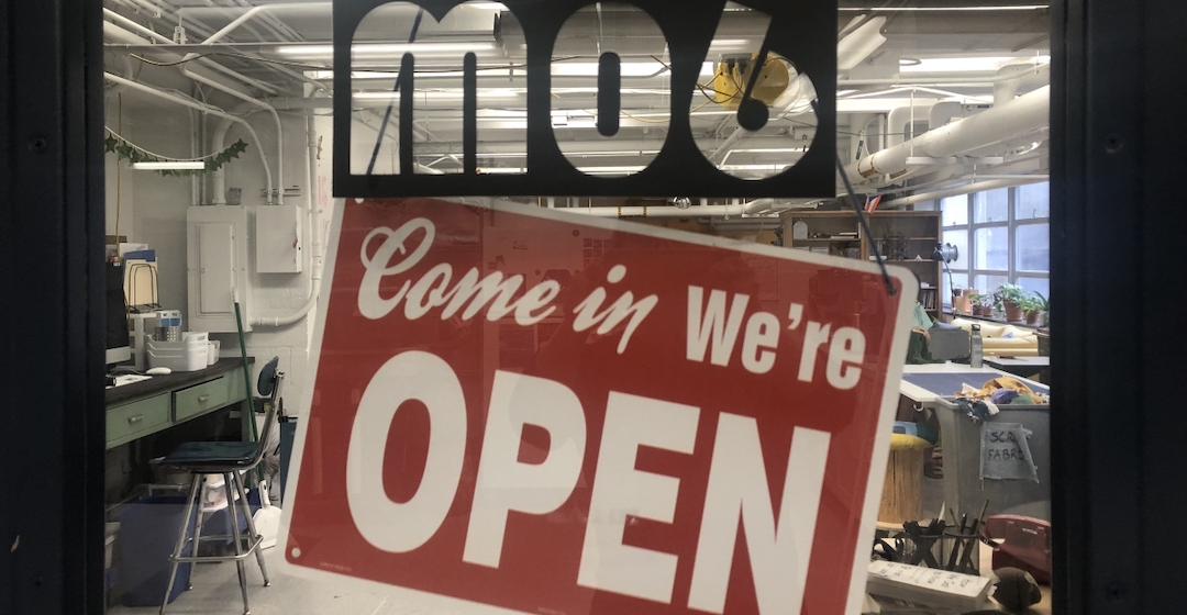 Come in We're Open Sign on Innovation Center Door