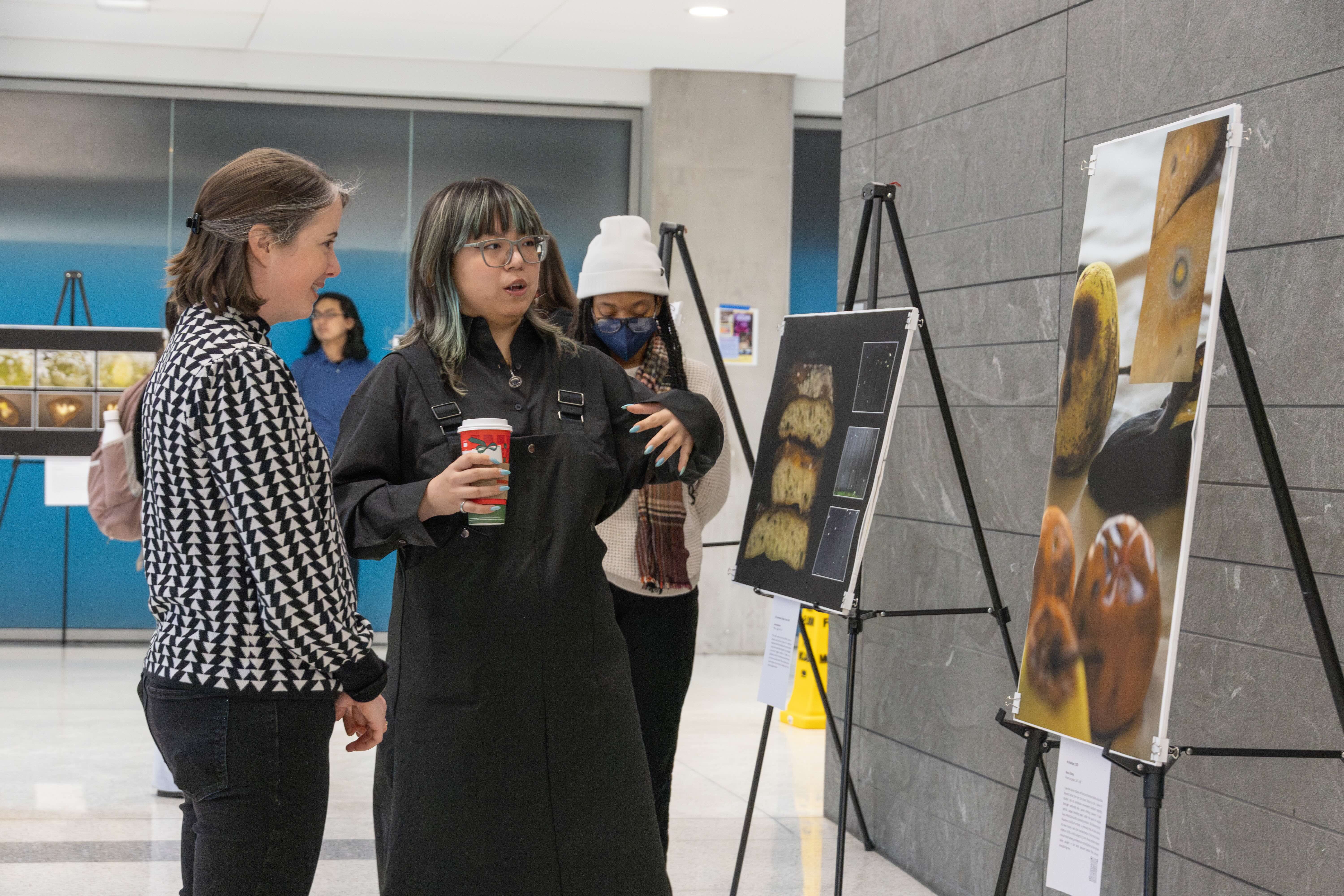 Nora Zhang speaking with Professor Caitlin Grady