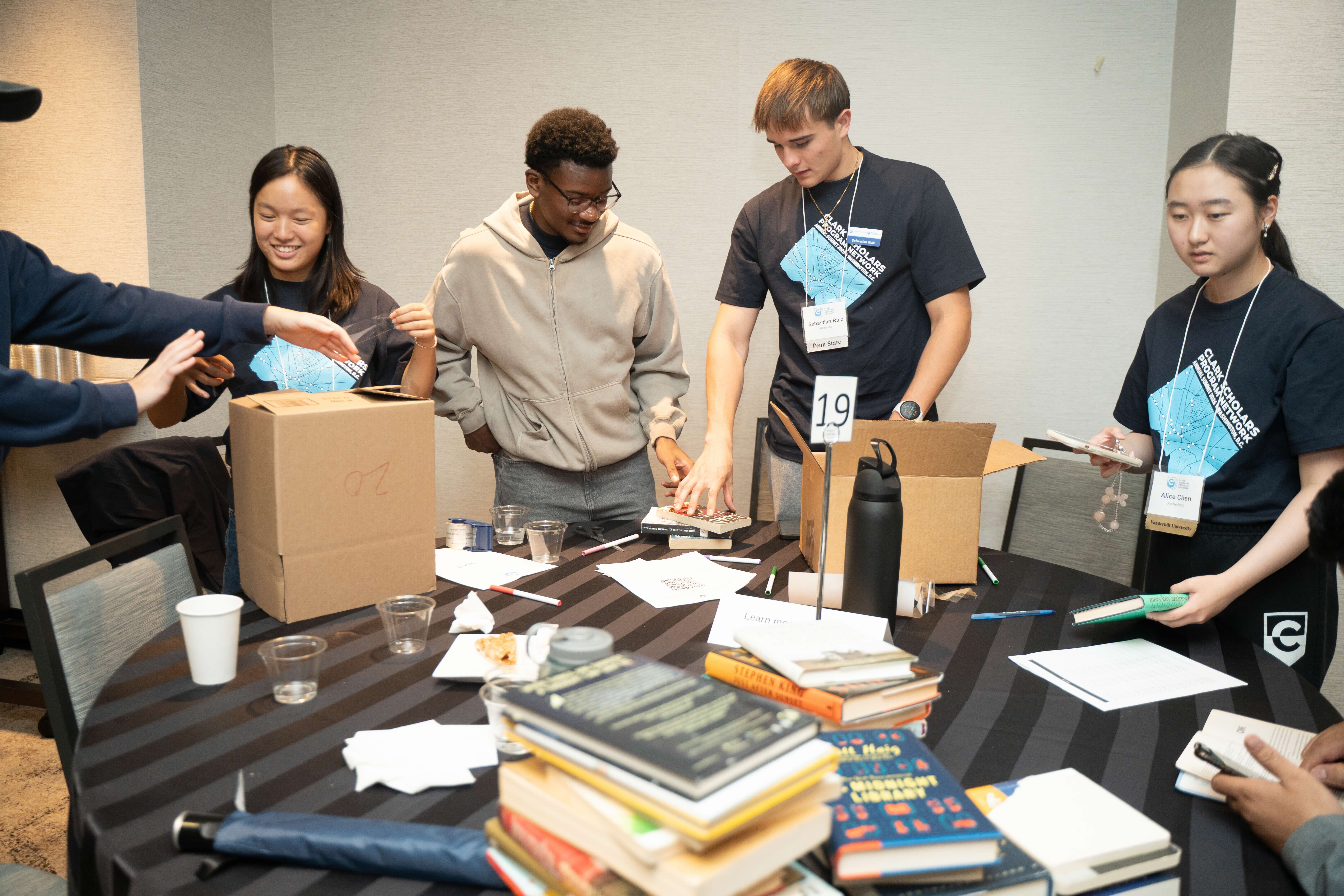 Clark Scholars packing books for affected communities in Jamaica