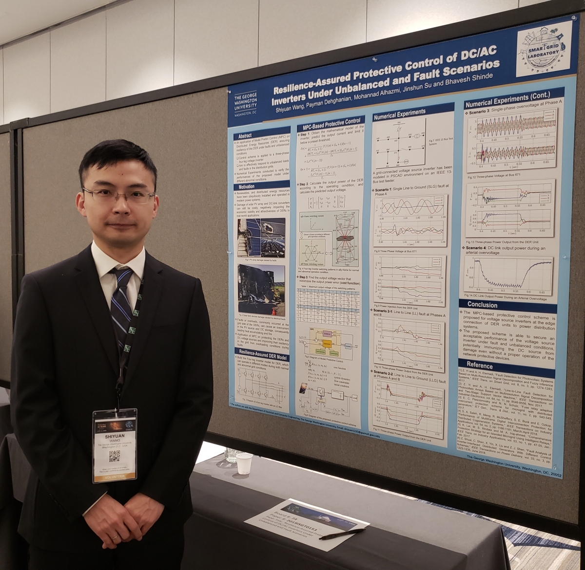 Shiyuan Wang and his poster