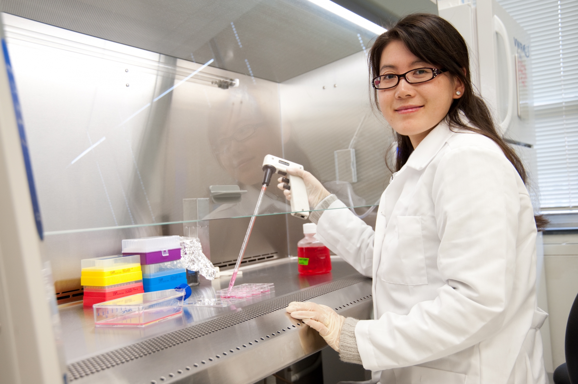 Dr. Lijie “Grace” Zhang in her wet lab