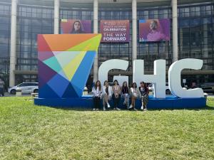 Computer Science undergraduate students posing in front of the GHC sign