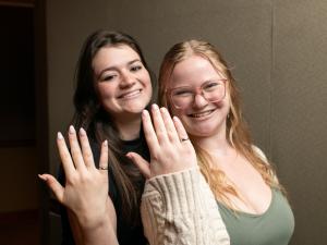 Engineering students pose with their rings