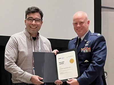 Nelson Jaimes receiving his award at the 2023 SPIE Disruptive Technologies in Information Sciences conference