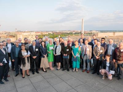 Inductees of GW's new NAI chapter pose with other members of the university's innovation community.