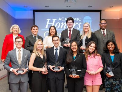 President Ellen M. Granberg and Provost Christopher Alan Bracey recognized the 10 Distinguished Scholars in a ceremony Thursday at University Student Center.