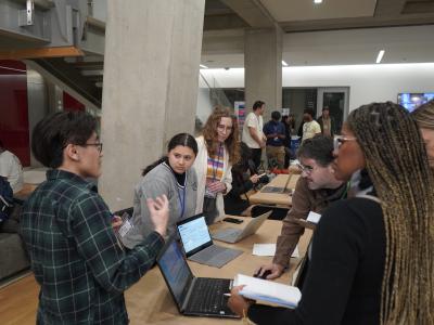 Participants presenting at the hackathon