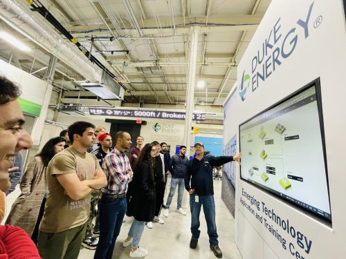 Participants watching a demonstration at Duke Energy Corporation of their emerging technologies