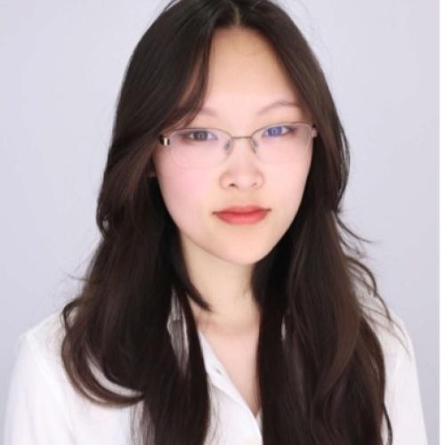 Student in white collard shirt 