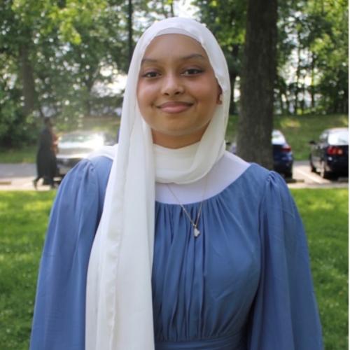 GW Student under a tree