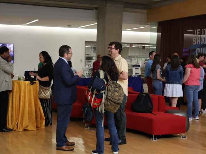 Dean Lach talking with GW Engineering alumni