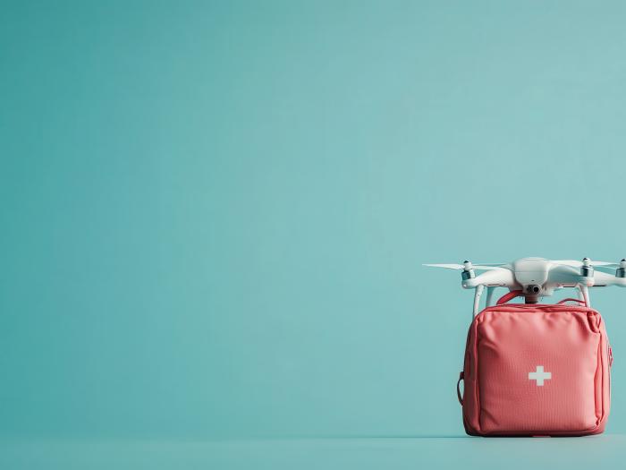 Drone delivering aid