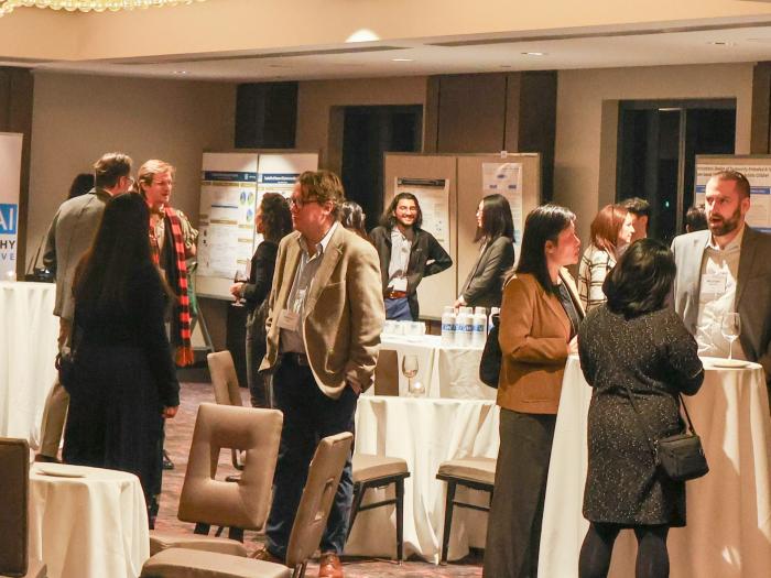 GW TAI reception attendees networking