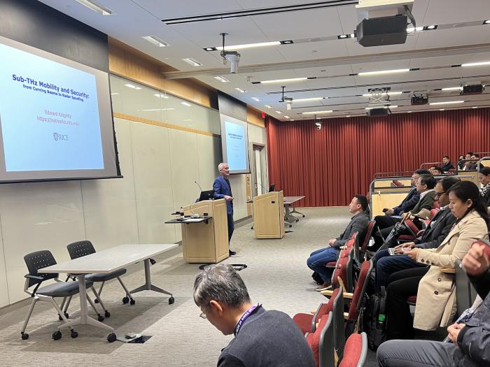 Attendees listening to Edward Knightley's presentation