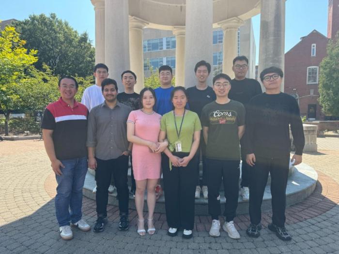 Professor Shuai's research group pictured together at GW
