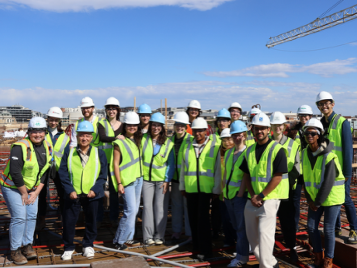 Students and professor at the construction site