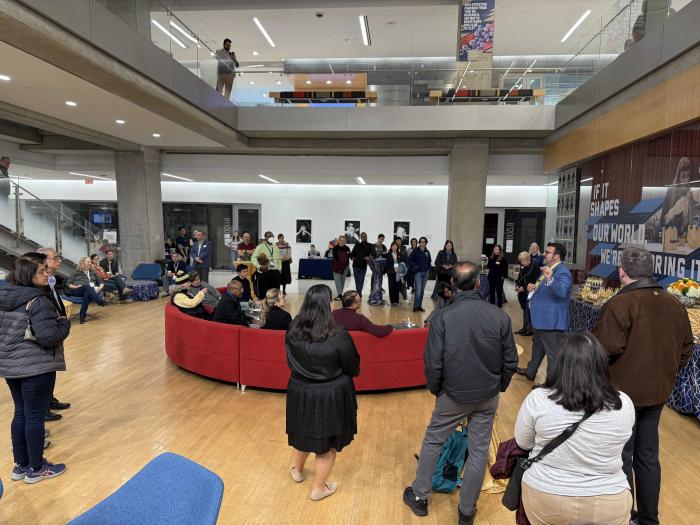 Alumni, family, and friends of GW Engineering listening to Dean Zara's remarks